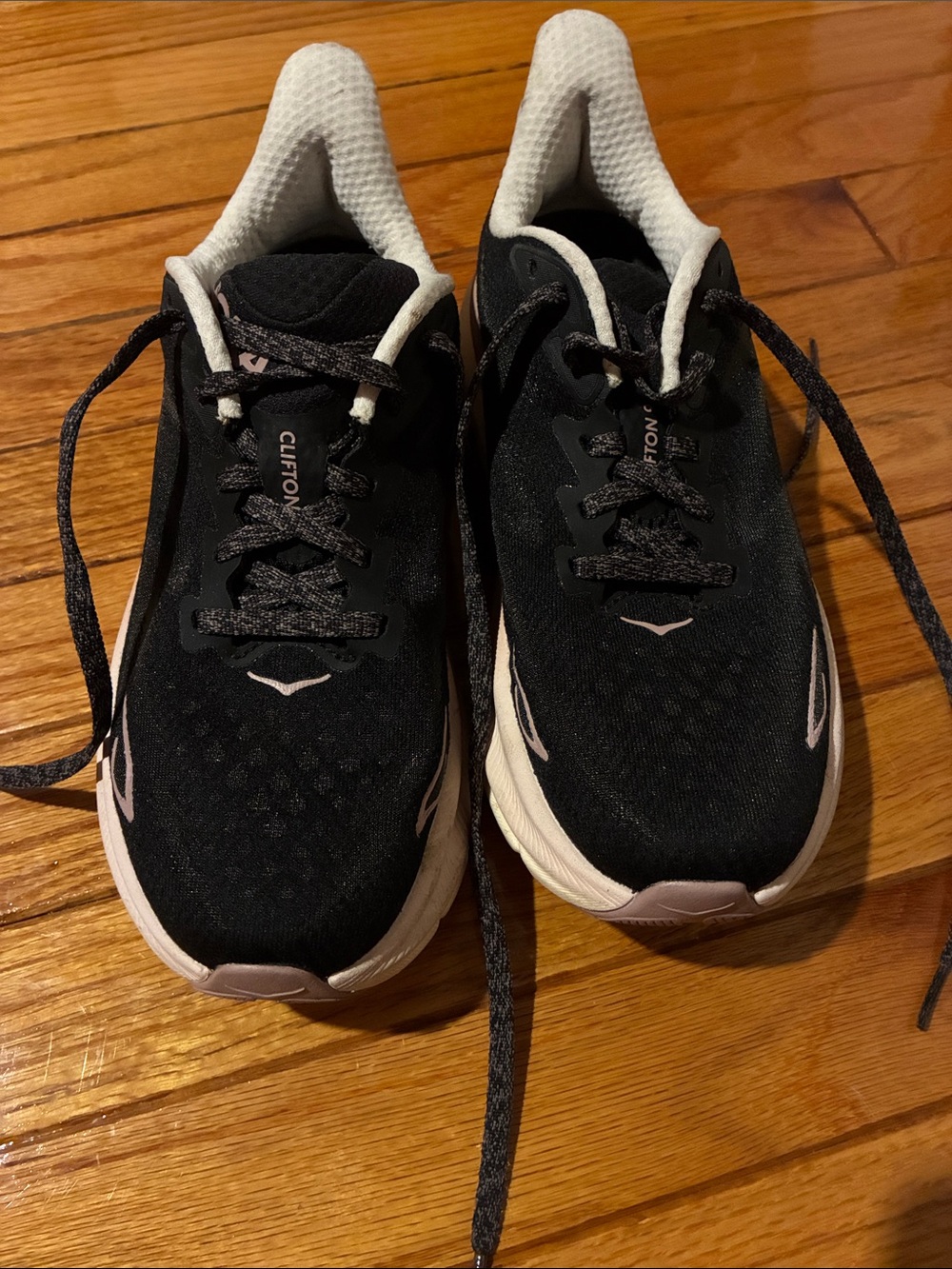 Hoka Clifton Black Running Shoes with Light Pink Accents